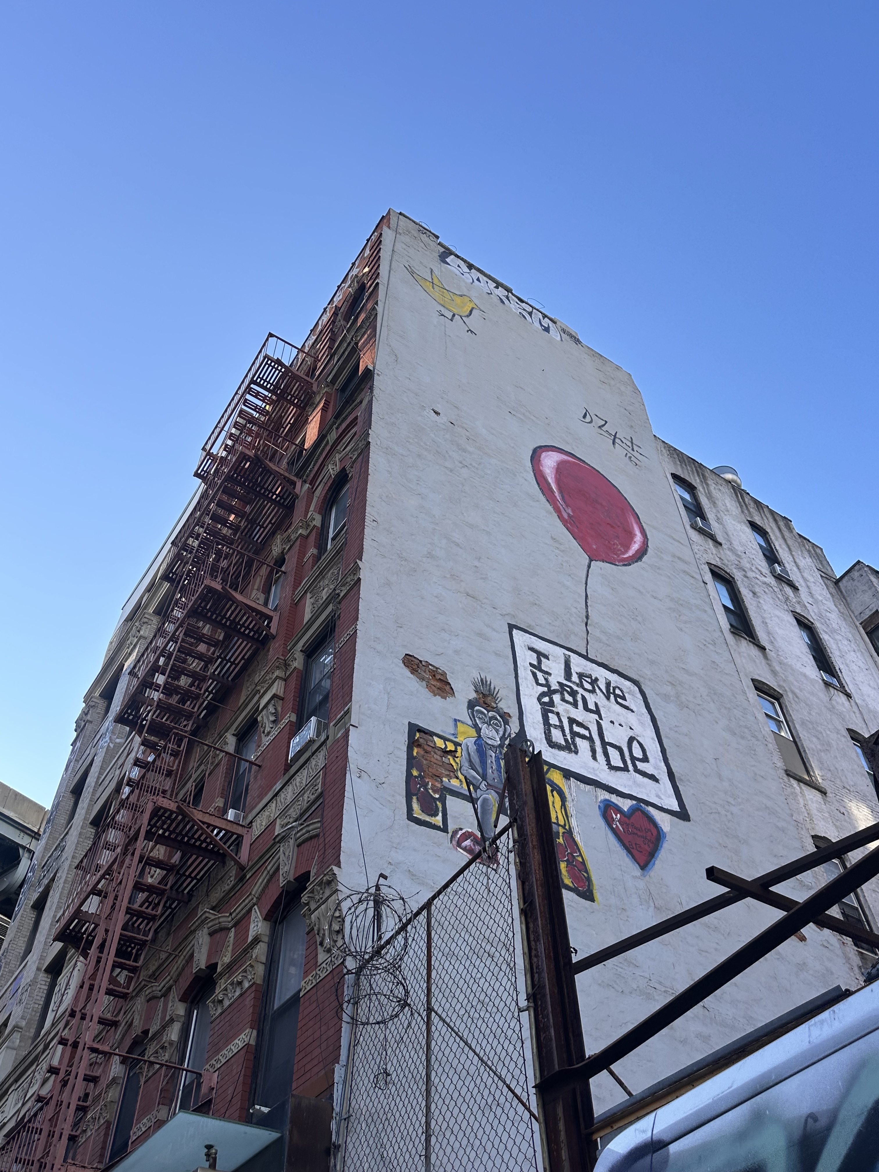 Tall arched Art Deco window with decorative metalwork — London