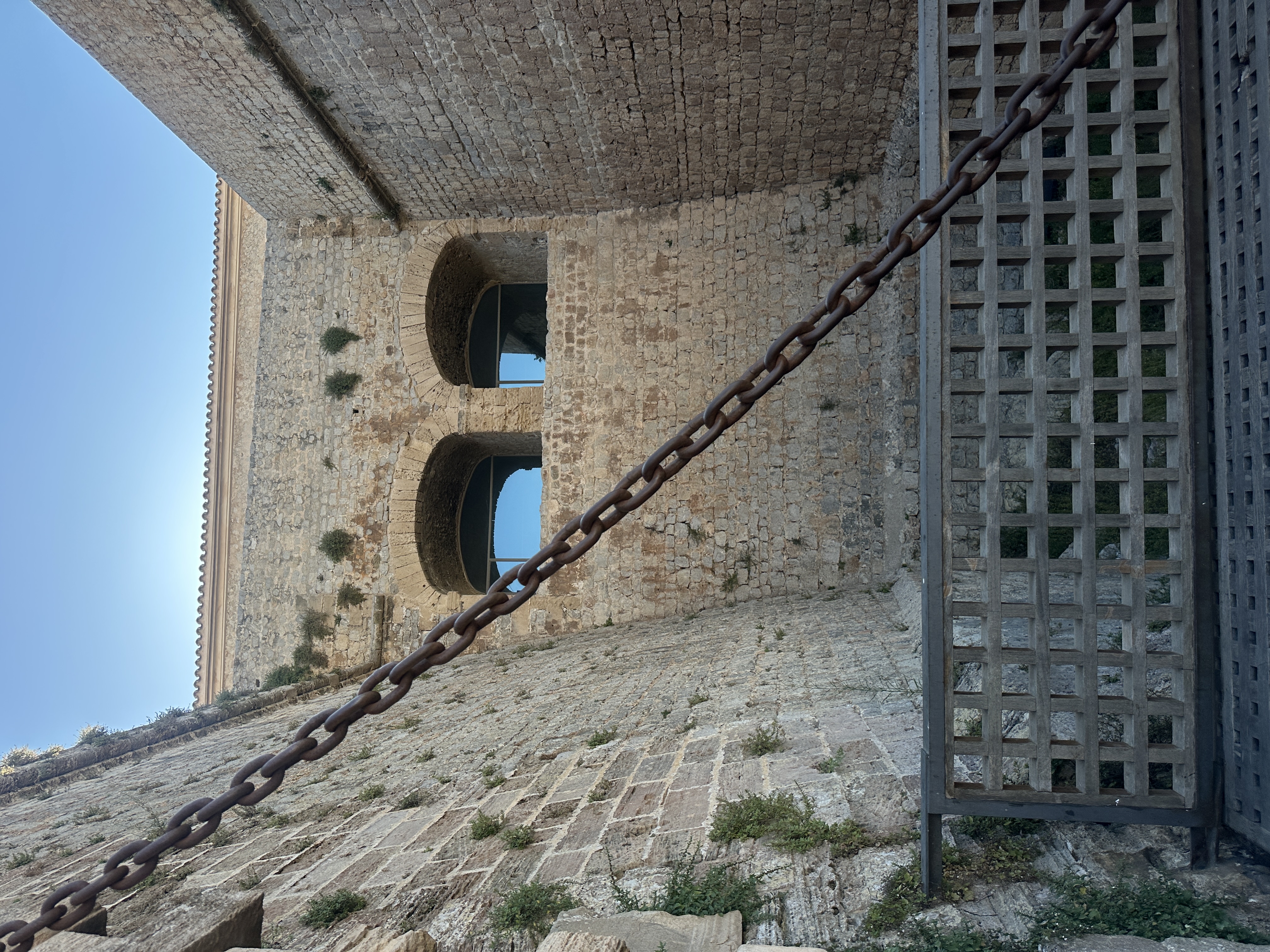 Tall arched Art Deco window with decorative metalwork — London