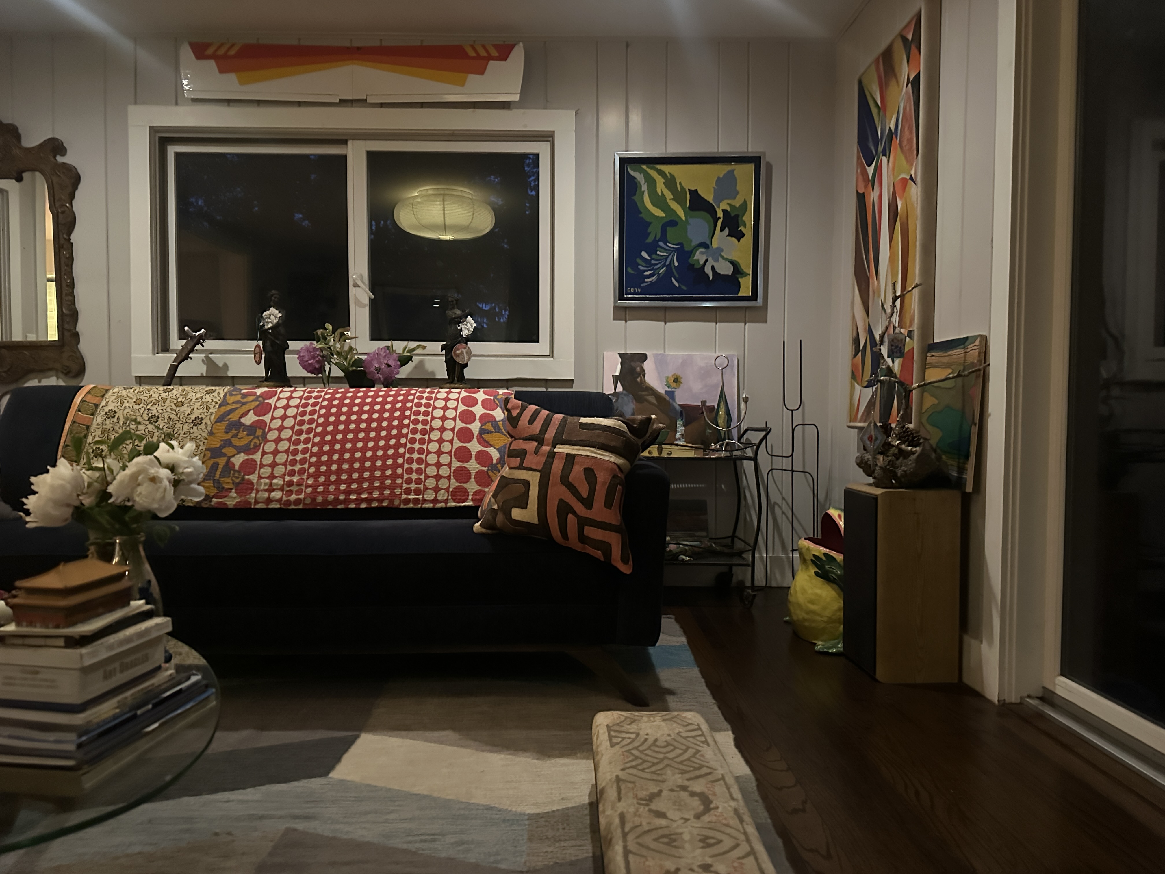 Tall arched Art Deco window with decorative metalwork — London