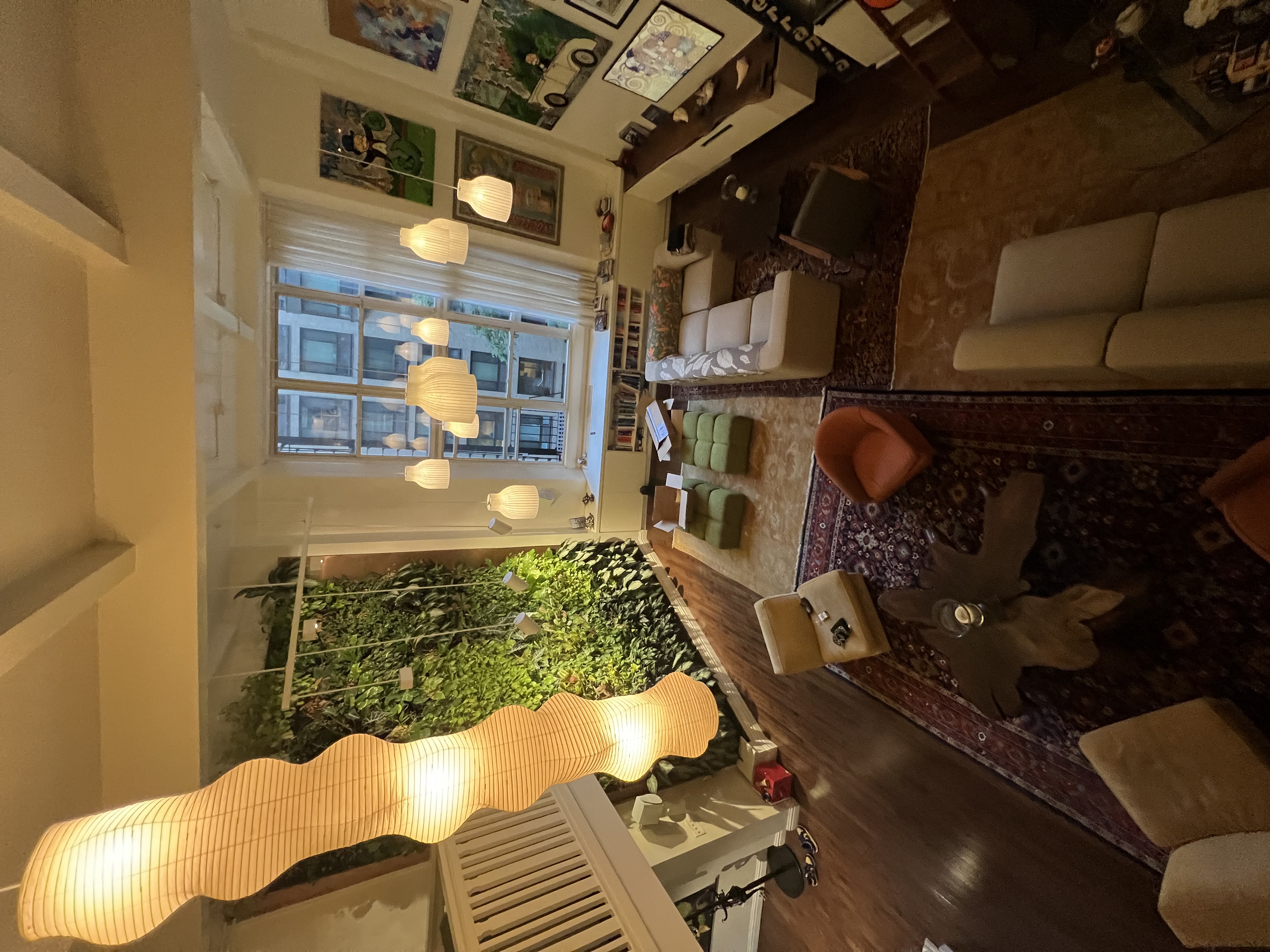 Tall arched Art Deco window with decorative metalwork — London