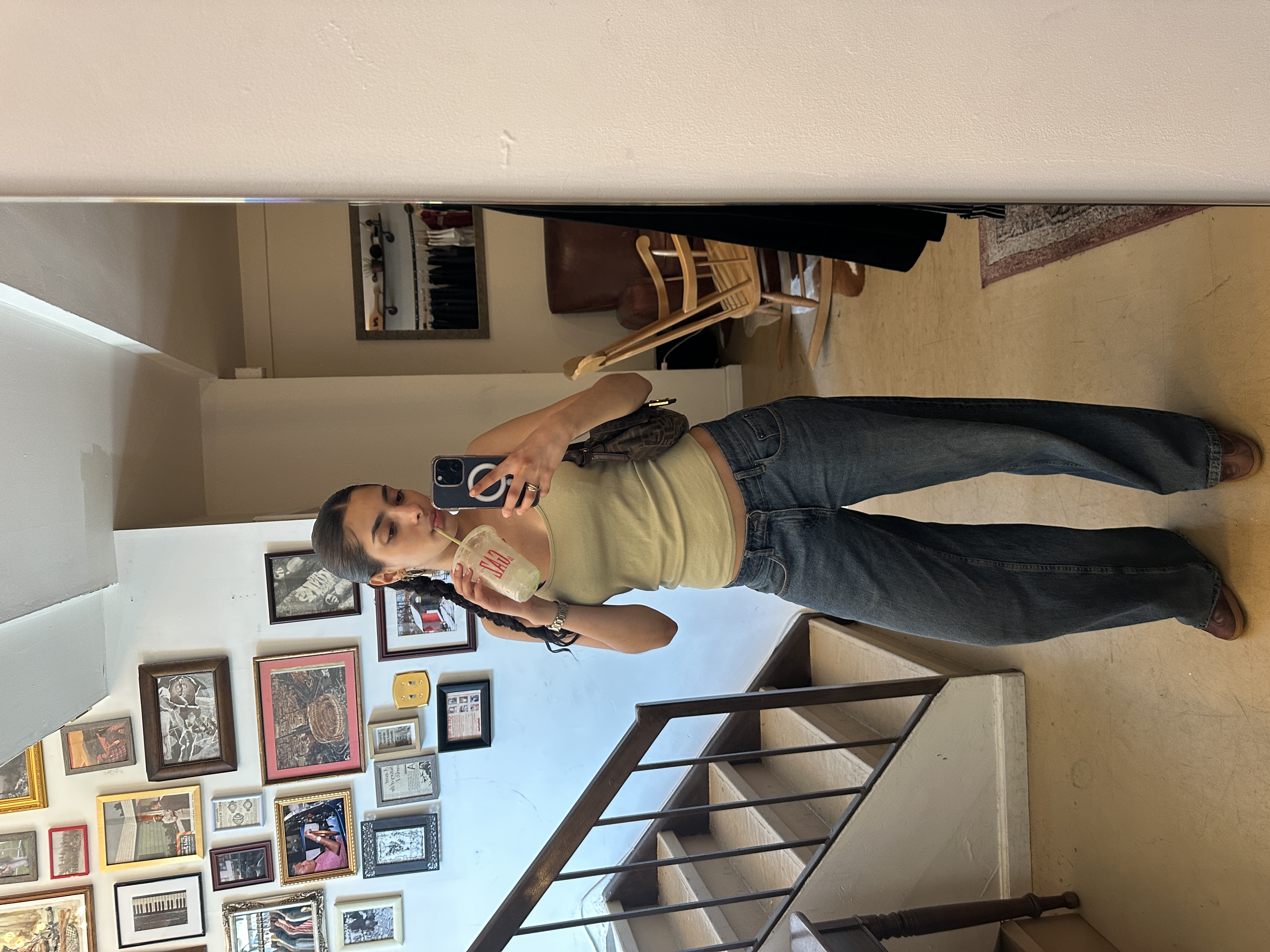 Tall arched Art Deco window with decorative metalwork — London