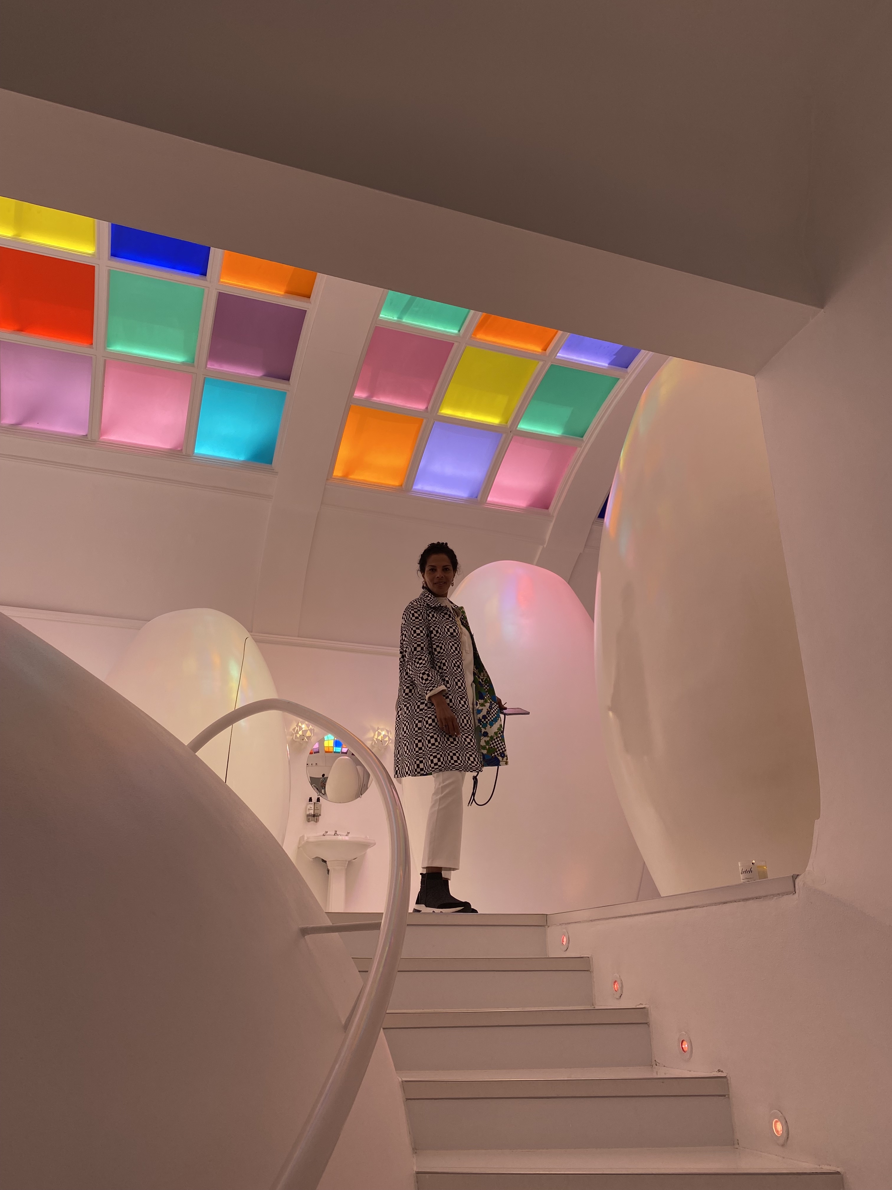 Tall arched Art Deco window with decorative metalwork — London