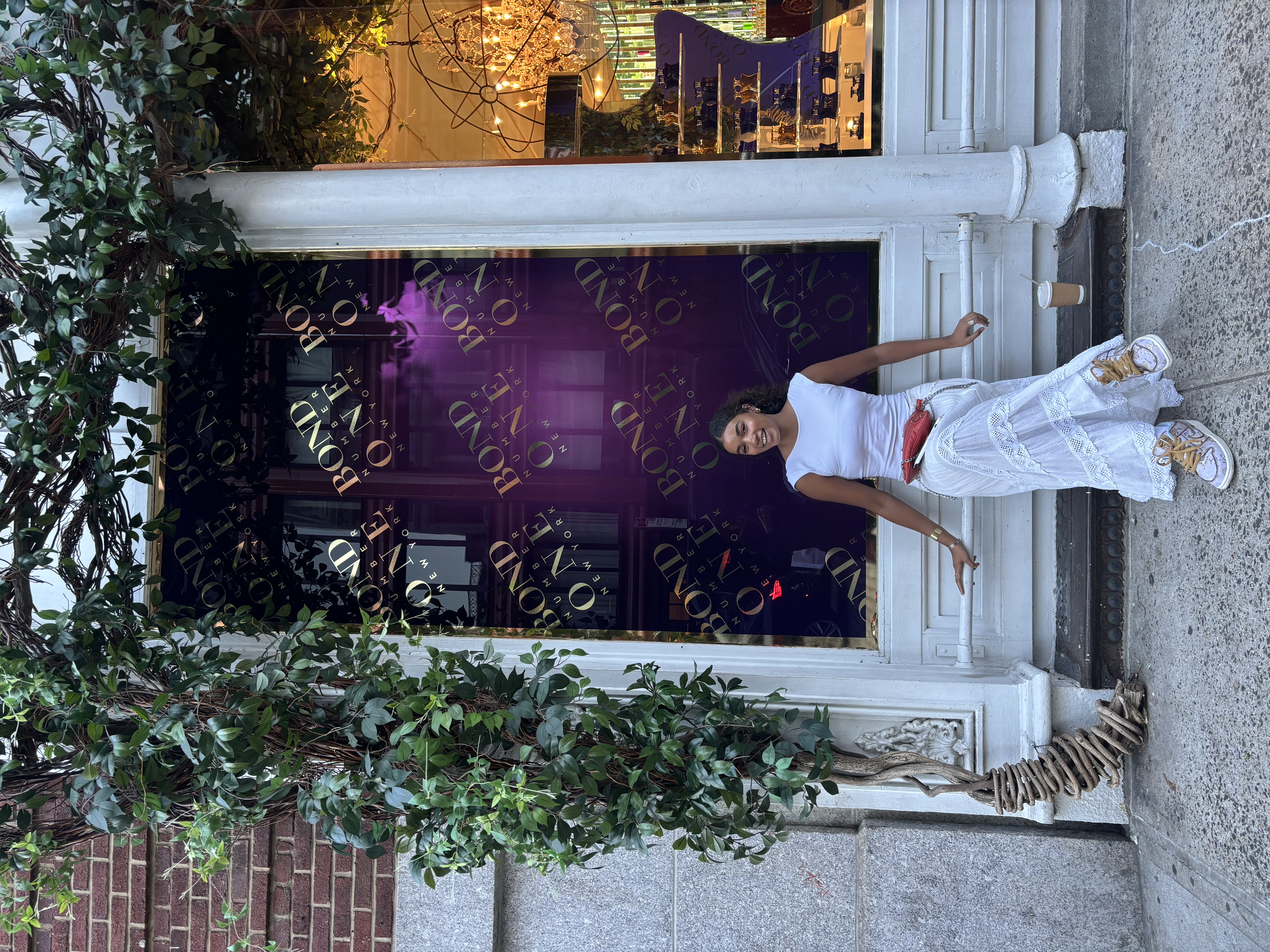 Tall arched Art Deco window with decorative metalwork — London